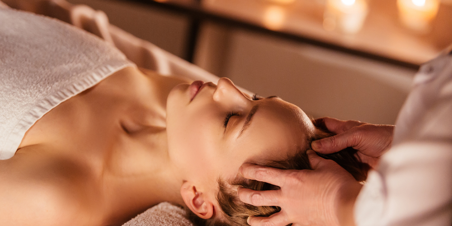 Woman having a head massage