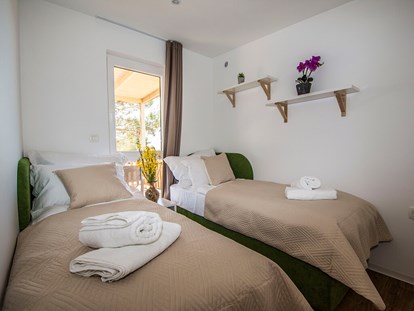 Luxuscamping - Badewanne - Kroatien - Campingplatz Ugljan - Meinmobilheim Premium 2 bedrooms auf dem Campingplatz Ugljan