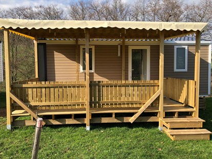 Luxuscamping - TV - Mullerthal - MobilHeim Neumuhle Park Neumuhle Luxemburg - Camping Neumuehle Muellerthal Neumuhle MobilHeim Glamping Neumuhle Luxemburg. 4 Pers. 2 Schlaffzimmer. Douche. Wc.