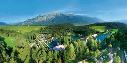 Luxuscamping - Parkplatz bei Unterkunft - Region Innsbruck - Ferienparadies Natterer See - Nature Resort Natterer See Safari-Lodge-Zelt "Rhino" am Nature Resort Natterer See