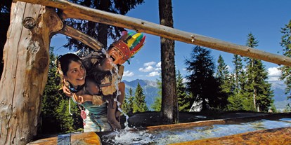Luxuscamping - Preisniveau: exklusiv - Tirol - Indianertag am Ferienparadies Natterer See - Nature Resort Natterer See Safari-Lodge-Zelt "Rhino" am Nature Resort Natterer See