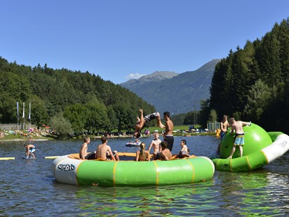 Luxuscamping - Art der Unterkunft: Hütte/POD - Region Innsbruck - Diverse Wasserattraktionen - Nature Resort Natterer See Schlaffässer am Nature Resort Natterer See