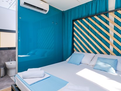Luxuscamping - Heizung - Kvarner - Sclafzimmer mit Bad - Camping Slatina Freedhome Mobilheime auf Camping Slatina
