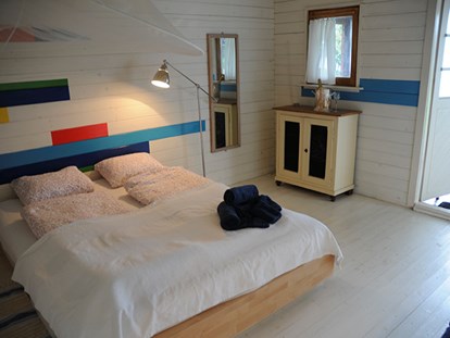 Luxuscamping - Preisniveau: gehoben - Schweiz - Das Cottage bietet Platz für 4 Erwachsene, mit einem Doppelbett und Ausziehsofa. - Camping Zürich Cottage auf Camping Zürich