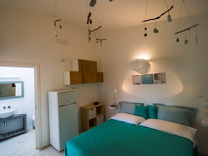 Luxuscamping - Klimaanlage - Sardinien - Superior-Einzimmer-Bungalow - Tiliguerta Glamping & Camping Village Superior-Einzimmer-Bungalows