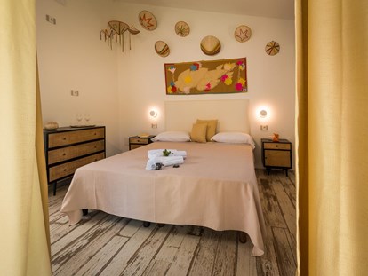 Luxuscamping - Klimaanlage - Costa del Sud - Tiliguerta Glamping & Camping Village Deluxe-Einzimmer-Bungalows 