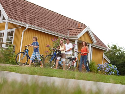 Luxuscamping - Terrasse - Niedersachsen - Familienfahrradtour - Südsee-Camp Ferienhaus Malmö am Südsee-Camp