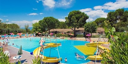 Luxuscamping - TV - Gardasee - Verona - Glamping auf Camping Cisano - Camping Cisano - Suncamp SunLodge Maple von Suncamp auf Camping Cisano