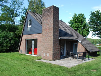 Luxuscamping - Art der Unterkunft: Strandhaus - Niedersachsen - Kleines Häuschen mit Garten - Falkensteinsee Ferienhaus am See