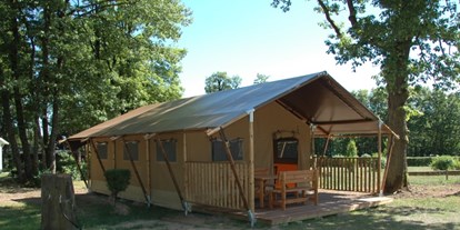 Luxuscamping - Terrasse - Heiderscheid - Camping Fuussekaul Gemütlich eingerichtete Safarizelte auf Camping Fuussekaul