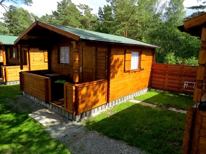 Luxuscamping - Terrasse - Fischland - Campingpl. NATURCAMP Pruchten Blockhütten