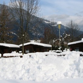 Glampingunterkunft: Chalets im Winter - Chalets auf Camping Brunner am See