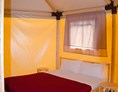 Glamping: Glamping-Zelte: Schlafzimmer mit Doppelbett - Camping Rialto
